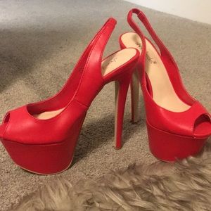 Giant red platform heels